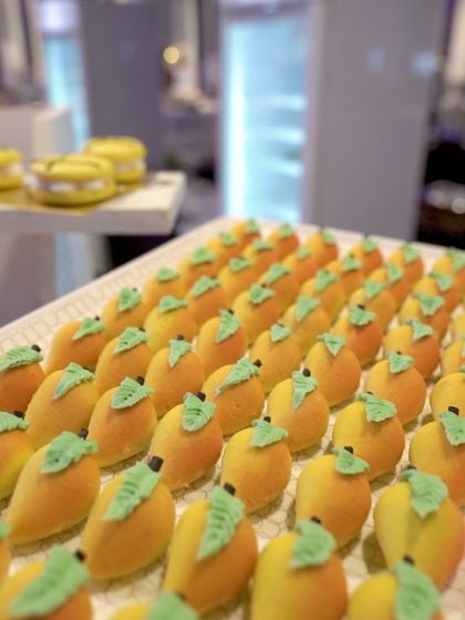 Adorable mango-shaped sweets, perfectly crafted to celebrate the golden season. A playful and delicious treat.