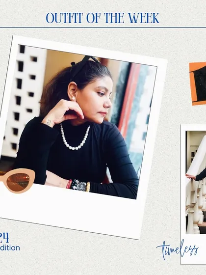 A closer look at the accessories that complete this timeless fall look. A simple pearl necklace and a hair bow add a touch of elegance to the black turtleneck, proving that small details make a big difference.