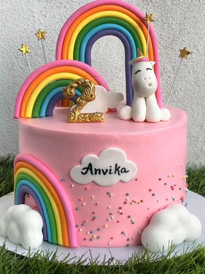 Another beautiful unicorn and rainbow cake, featured in a collage. This design is bright, happy, and perfect for a child's birthday.