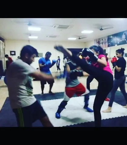 A look inside one of our energetic group kickboxing classes. Students are practicing sparring drills, learning both offense and defense in a controlled environment.