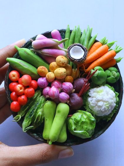 A full basket of my hyper-realistic miniature vegetables, a true work of art.