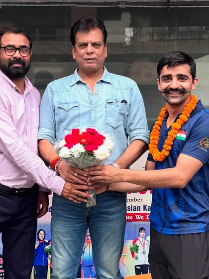 Giving my blessings to a member of the team. Our office serves as the central hub for all official karate activities in India.