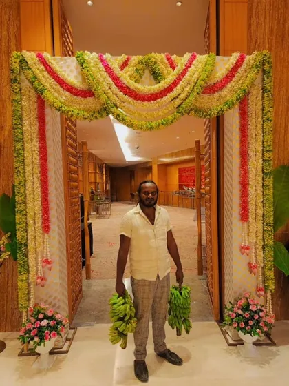A photo of me at a wedding event. I am always on-site to ensure that every decoration is perfect and the client is happy.