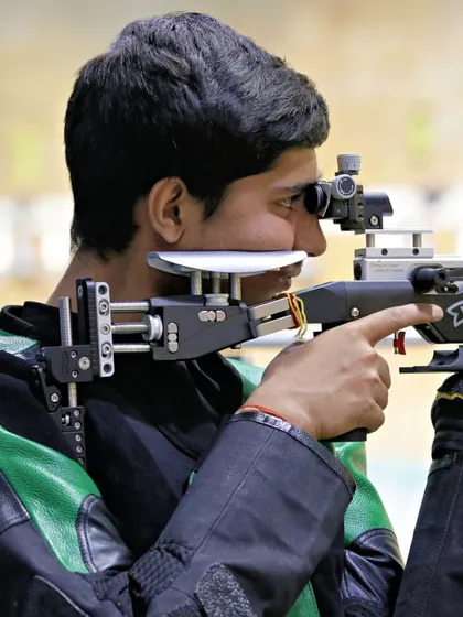 Another young rifle shooter taking aim. I ensure my competitions are welcoming for sub-youth and youth categories, giving them crucial match experience early in their careers.