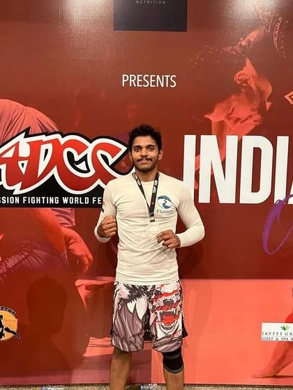 A proud moment in front of the official ADCC India backdrop after winning the silver medal. This competition tests your submission skills against the very best.