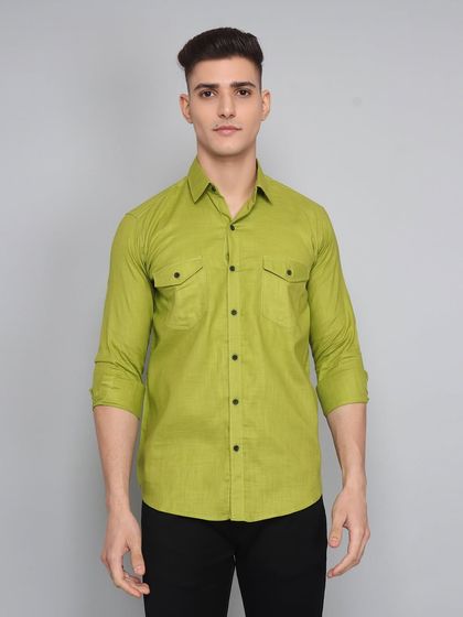 A direct, front-on shot of the green shirt, clearly displaying the double pockets and button details for online shoppers.