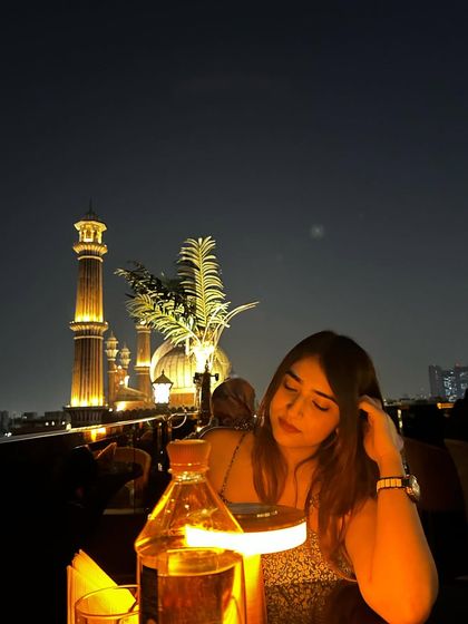 A more thoughtful, candid-style shot at Gumbad Cafe. This creates a romantic and serene mood.