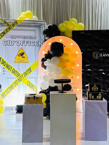 A unique CID Officer themed party, complete with a "Crime Scene Do Not Enter" backdrop, a 3D textured wall, and a yellow and black color scheme. We planned and executed this in just 5 hours!