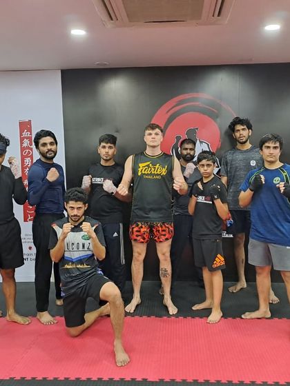 Training, training, and more training. A dedicated group of students with their coach, always pushing to improve.