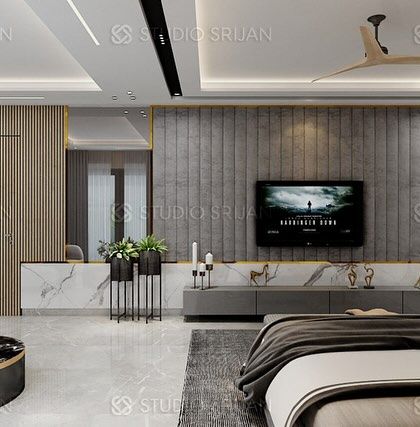 A luxurious bedroom in a DLF residence, featuring a TV wall with a mix of grey fluted panels and marble, creating a sophisticated and textured look.