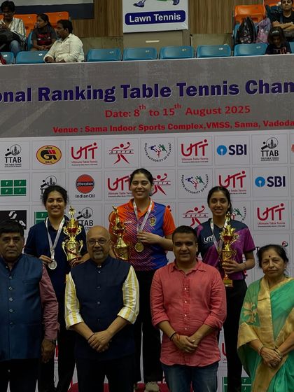 The women's singles podium, featuring our player Yashashwini with a bronze medal.