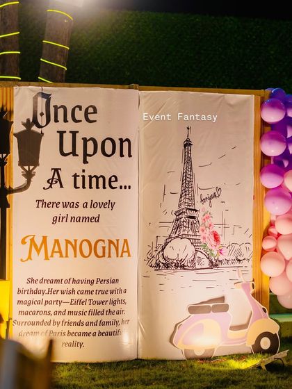 A personalized storybook prop for Manogna's Parisian party, telling her "Once Upon a Time" story.