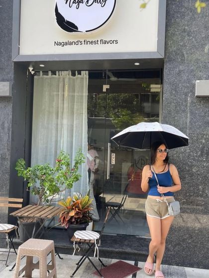 A wonderful customer enjoying a sunny day outside our restaurant. We cherish these moments and the heartwarming connections we make.