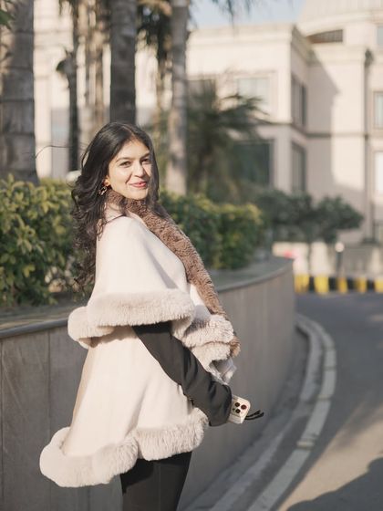 A side profile of the cape, showing how it drapes beautifully over the shoulders.