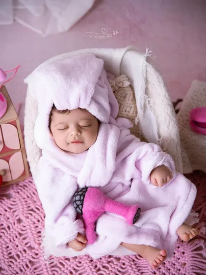 A spa day for the tiniest diva! These fun, quirky themes are a wonderful way to capture a bit of playful personality. I provide all the props, from the tiny bathrobe to the miniature hairdryer, for a truly unique and memorable shot.