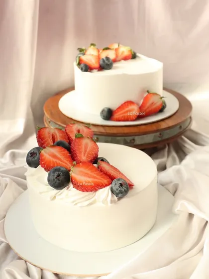 Two of my fresh berry cakes, ready for a double celebration.