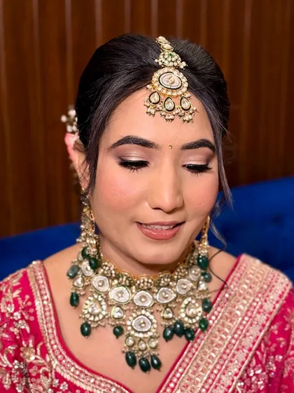 A close-up of Vidhi's bridal eye makeup. The soft, neutral tones with a hint of shimmer create a sophisticated and elegant look.