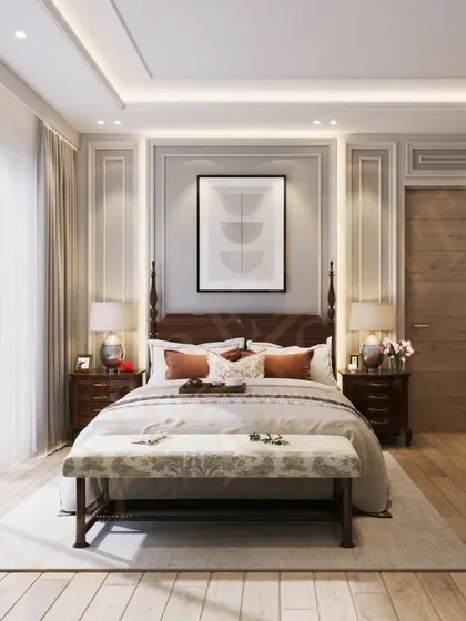 This bedroom blends comfort and style with its classic four-poster bed, light wood floors, and large windows that flood the space with natural light.
