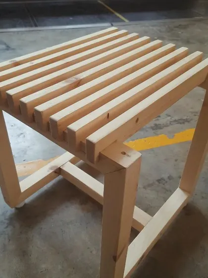 This minimalist slatted stool was a final project for students in our conventional woodworking course. It required precise cutting and spacing to achieve the clean, modern aesthetic, teaching valuable lessons in repetition and accuracy.