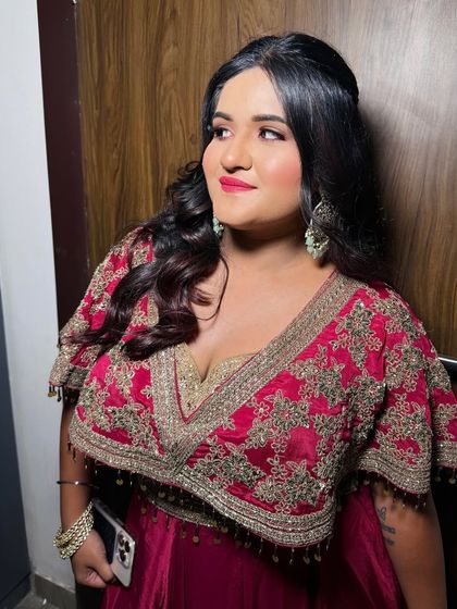 A side profile showing the elegant hairstyle.