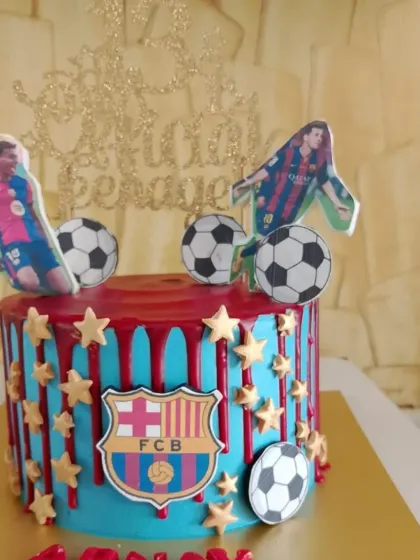 For the ultimate football fan, I created this FC Barcelona themed cake. It features the club's crest, edible player cutouts, and a vibrant red and blue drip design. It’s the perfect way to celebrate a birthday with team spirit.