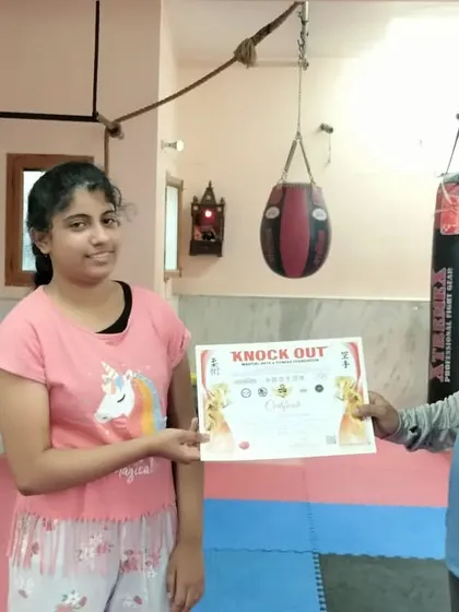 I personally award each certificate during our belt promotion ceremonies. It is important to recognize and celebrate every step of a student's journey in martial arts.