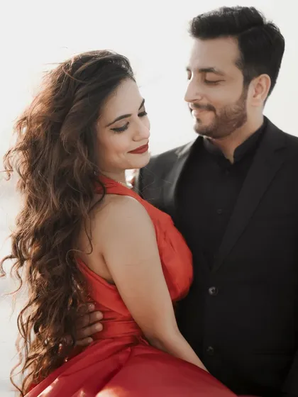 A close-up pre-wedding shot capturing the tender gaze between the couple, highlighting their chemistry and affection.