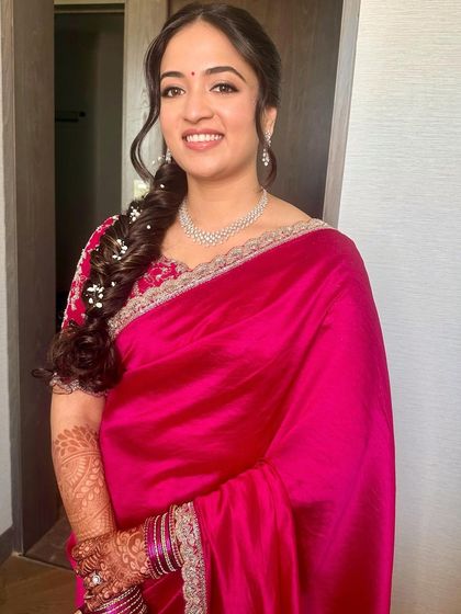 A happy, smiling portrait that radiates warmth and elegance.