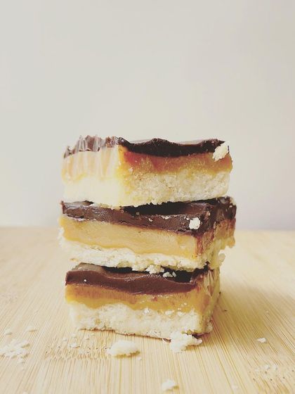 A stack of our three-layered Regal Riches bars, a star component of our Rakhi Celebration Hamper.