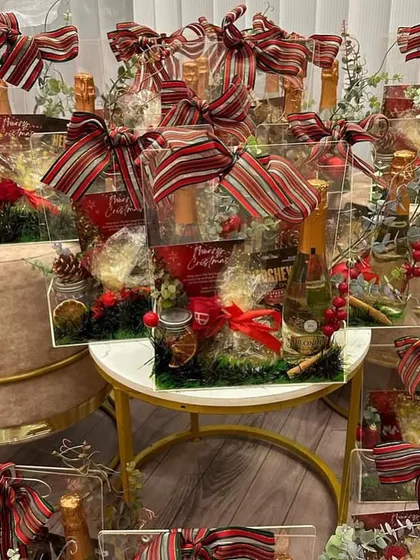 The warm glow of fairy lights makes our Christmas hampers even more magical.