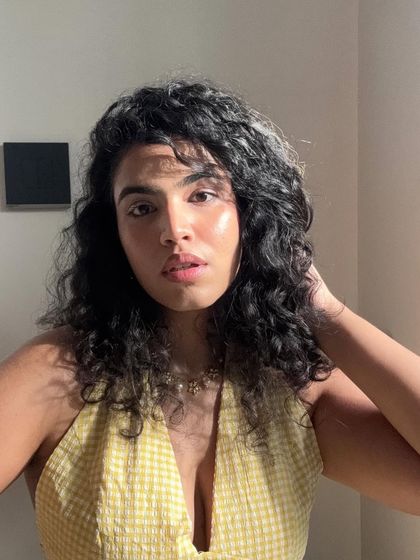 A sun-kissed selfie, with the light hitting my face perfectly. This shot is all about that golden hour glow.