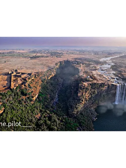 A wide aerial shot of a magnificent waterfall carving its way through the landscape. I used my DJI Mavic Air 2s to get this perspective.