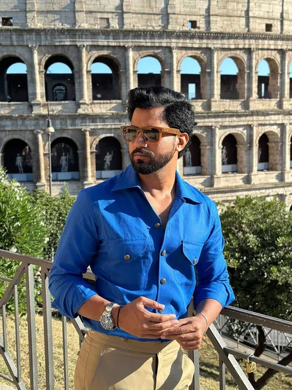 This shot captures the essence of la dolce vita, with our client looking dapper and relaxed in our royal blue shirt.