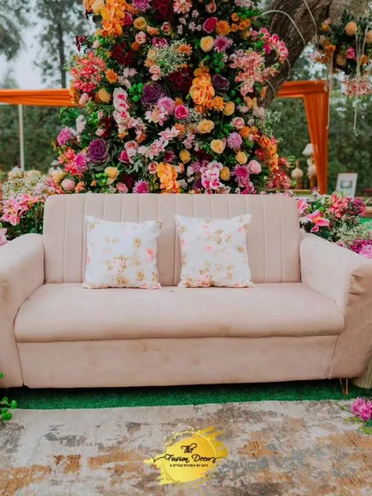 The perfect photo spot! I created this stunning floral backdrop, completely enveloping the seating in a cascade of vibrant, real flowers. It’s a beautiful and fragrant setting for the bride-to-be.