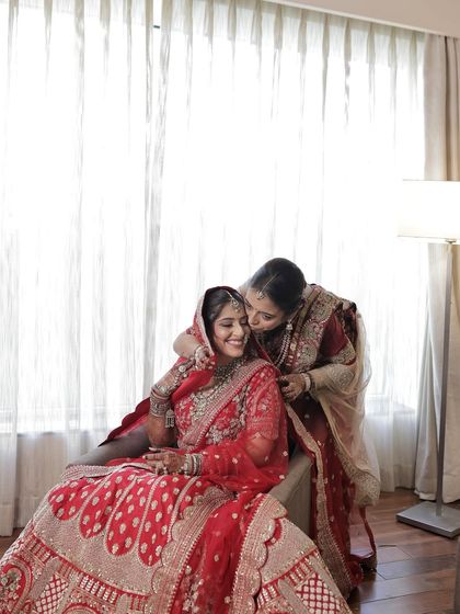 A beautiful, candid moment between the bride and her mother. My makeup is designed to be long-lasting and picture-perfect, capturing these precious memories flawlessly.