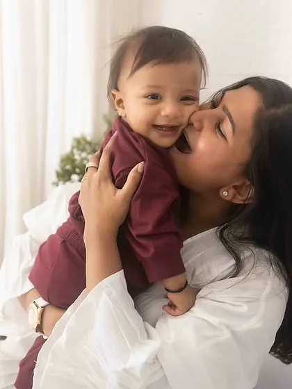A sweet kiss for a giggling baby. These are the moments that melt my heart and make for the best photographs.