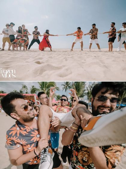 Fun and games on the beach at a destination wedding in Phuket. A tug-of-war is a great way to get everyone involved and laughing.