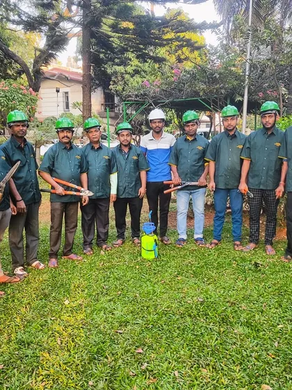 Another photo of our hardworking team in a garden we maintain. We work together to ensure every detail is taken care of.
