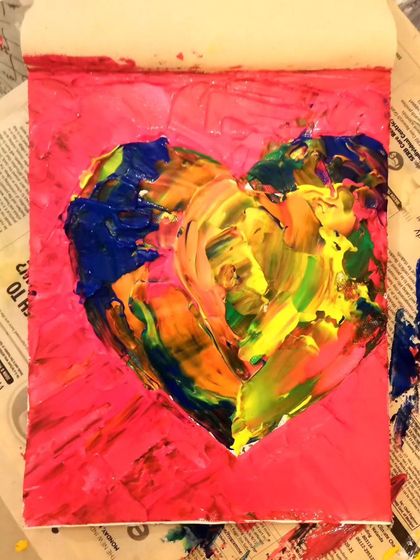 A duplicate shot of the "Apples and Oranges" piece, still on the newspaper-covered studio floor. It's a raw look at the art before it's presented to the world.