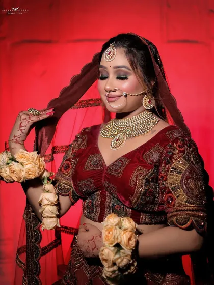A soft, candid-style shot of the bride with her eyes closed, highlighting the makeup and the texture of the velvet blouse.