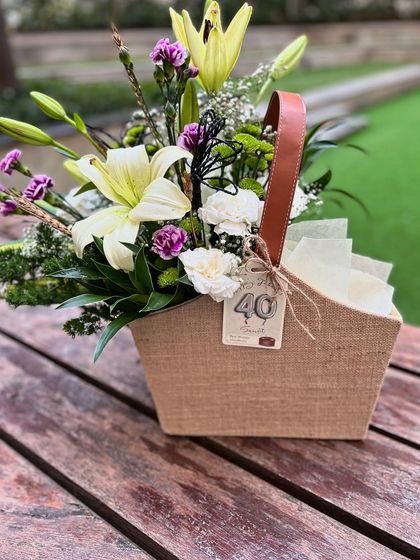 Simple, elegant, and stylish is my signature, perfectly captured in this floral gift basket for a milestone birthday.