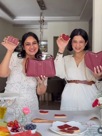This is us, a mother-daughter team, celebrating a wonderful collaboration! We created custom cookies shaped exactly like the brand's beautiful handbags for their Mother's Day campaign. It's our joy to bring a brand's vision to life in the sweetest way possible.