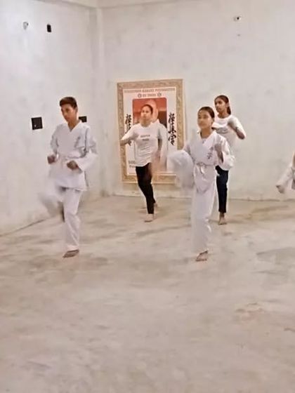 Knee raises are a great warm-up to prepare the legs for kicking drills.