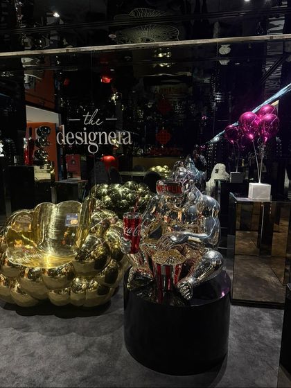 A glimpse into our curated booth at Colosseum, Hyderabad. This image shows how we transform spaces outside our main gallery, creating moods with bold lines and a touch of quiet luxury.