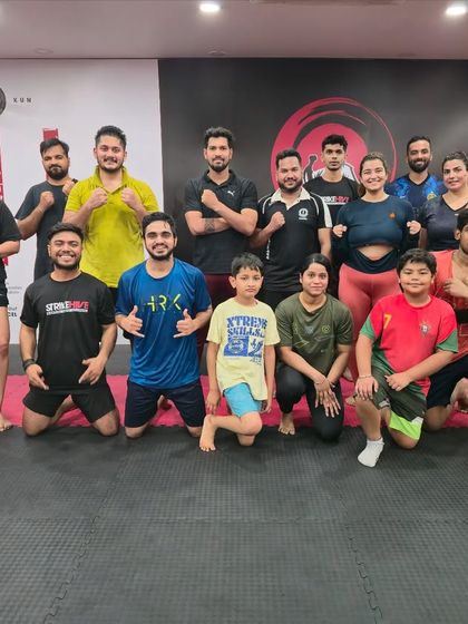 Saturdays are for training with the team. This group photo includes some of our youngest members, highlighting our all-ages approach.