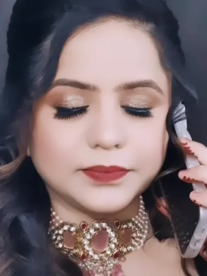 Even while on the phone, the makeup looks flawless. This is a testament to creating looks that are beautiful from all angles and in any situation.