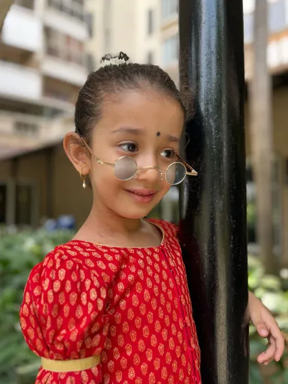 A pensive moment from our little star. Dance is also about storytelling and emotion, and she's already learning to express a range of feelings.