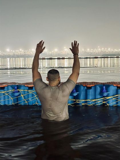 A powerful dip in the Ganga during the Mahakumbh. An experience of immense spiritual energy.