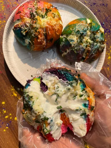 The inside of my Holi Korean Cream Cheese Bun is just as colorful and packed with delicious, gooey cream cheese.