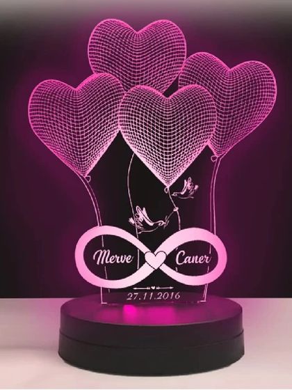 An alternative design for the infinity love lamp, this version features two birds holding the infinity symbol. It can be personalized with two names and a date, making it a unique anniversary gift.